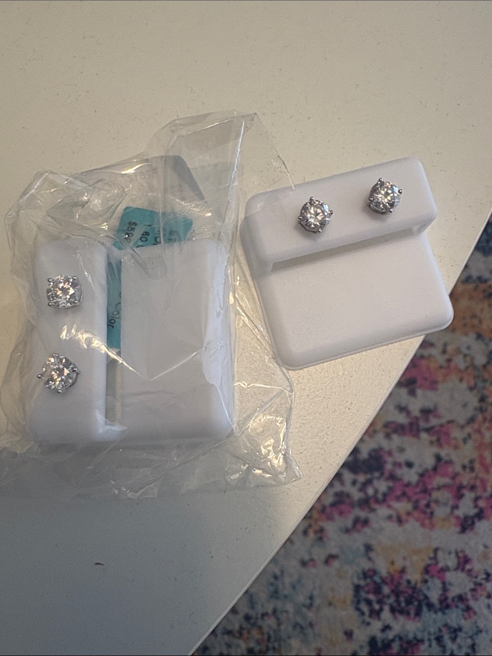 Moissanite diamond studs over sterling silver stamped 925- identical